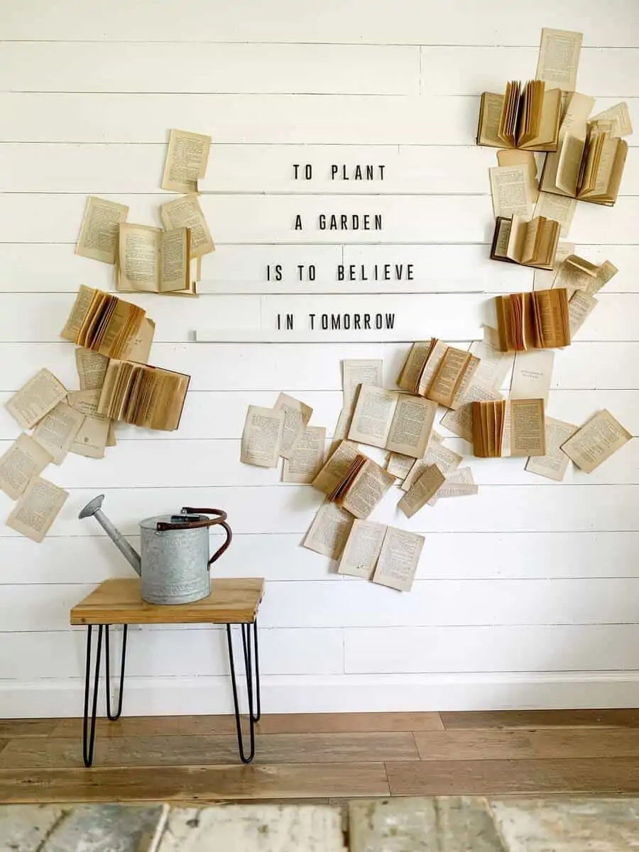 book wall with brown books and a table paper craft ideas for wall decoration