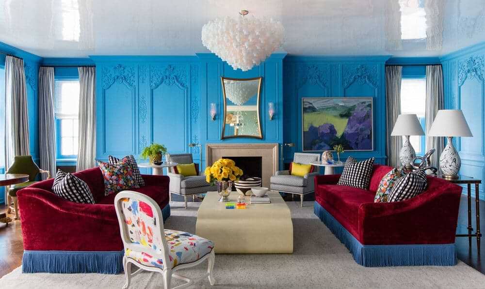 Triadic colour scheme with blue walls with mouldings