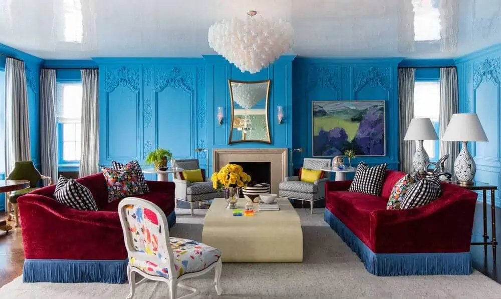 Triadic colour scheme with blue walls with mouldings