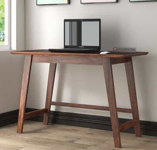 dark brown wooden minimalist table with laptop