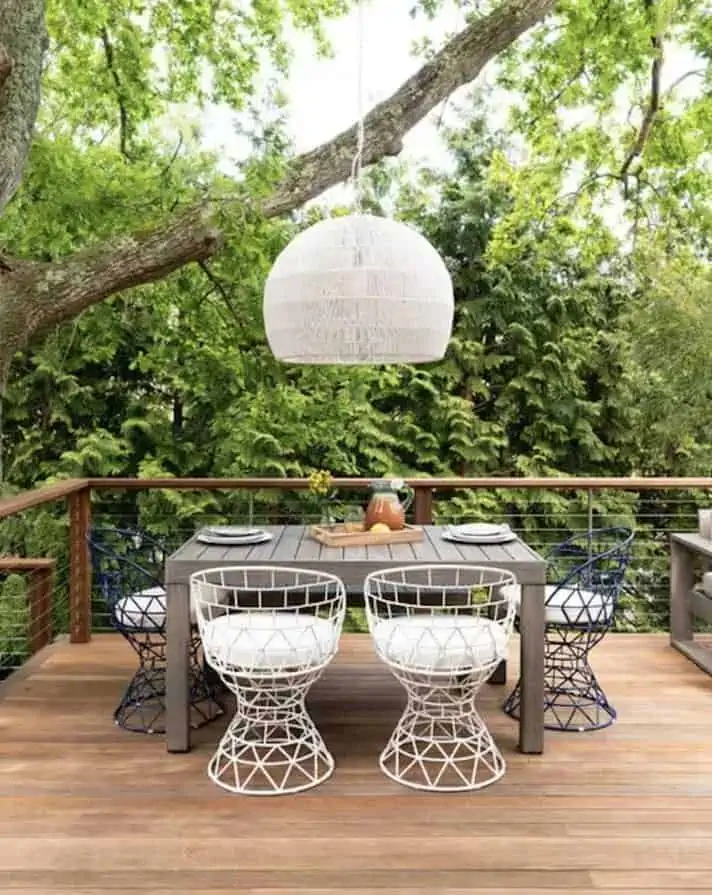 White modern hanging light over balcony seating