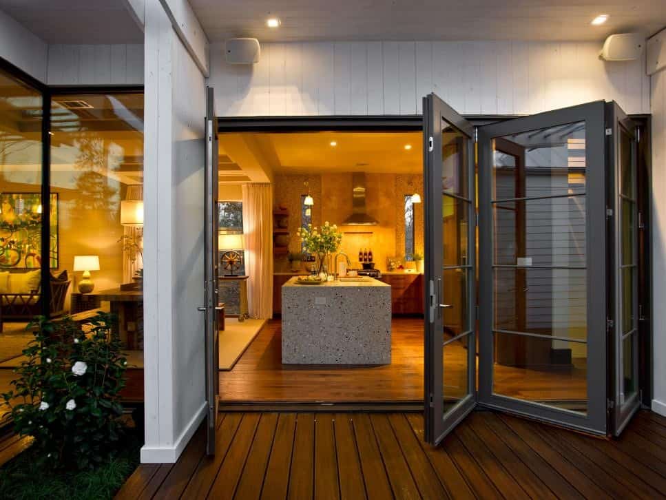 stunning black sliding and folding door with stone cabinet