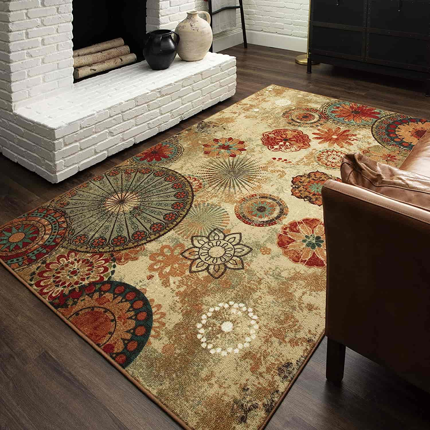 jaipur style multi colored rug in red and golden hues