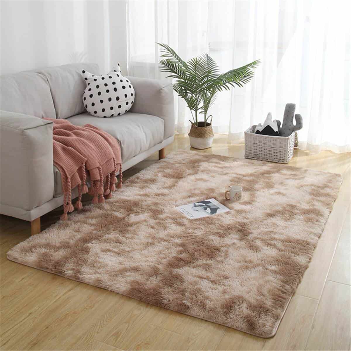 comfy cozy rug in brown earthy tone with a white sofa