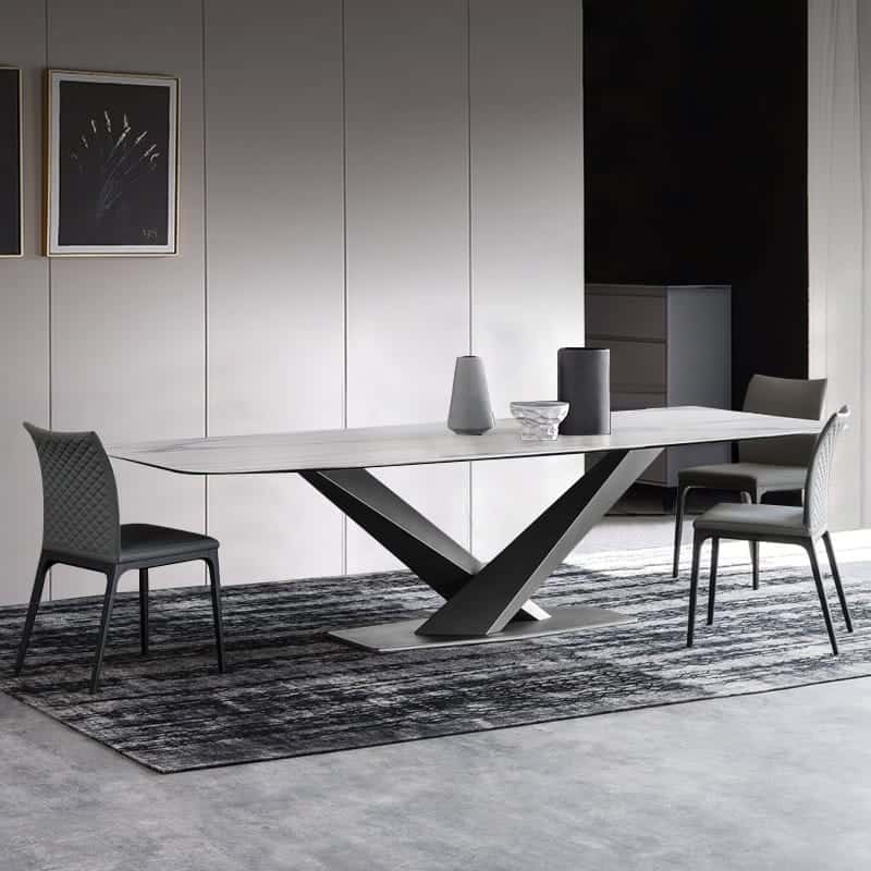 dining table inside a dining room with black and white hues