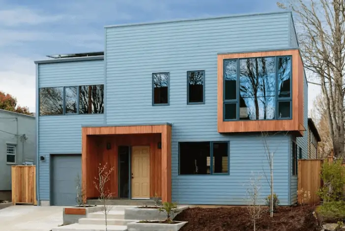 blue house, wood work, glass windows, painted from top paint brands