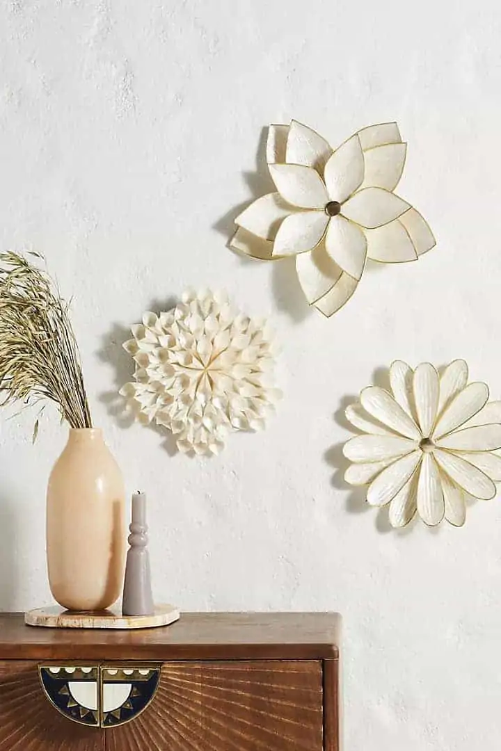 DIY paper crafts wall decoration ideas for living room or bedroom florals in white with a brown table and a vase
