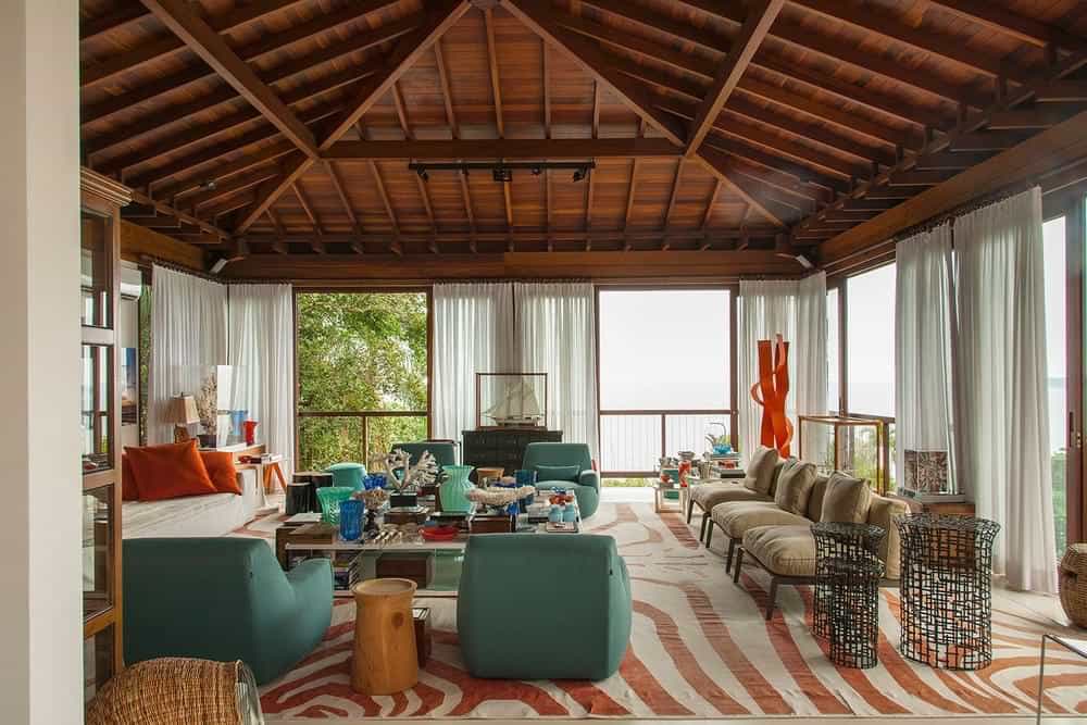 Large room with wooden brown ceiling