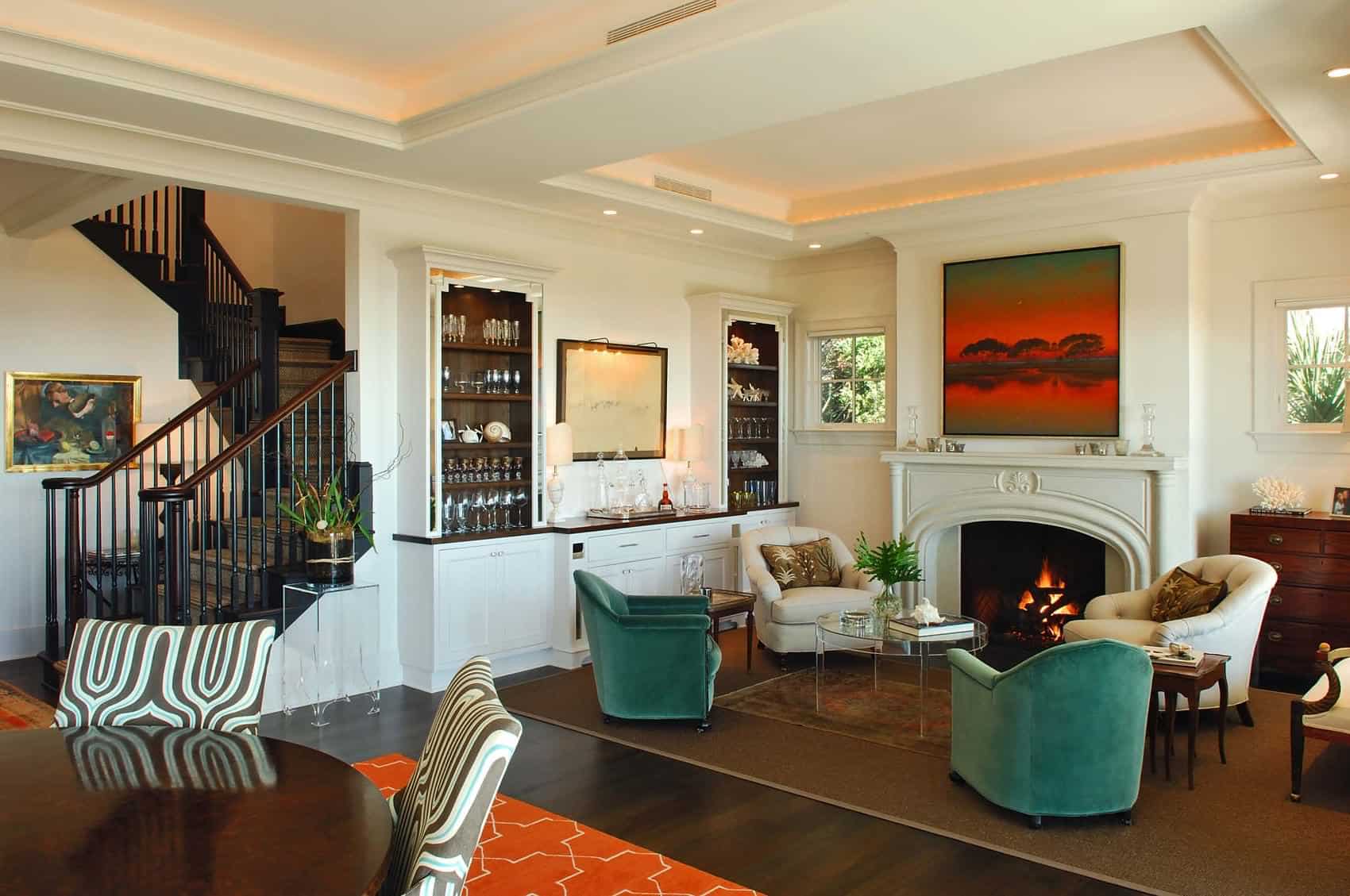 Living room with minibar and fireplace in white room