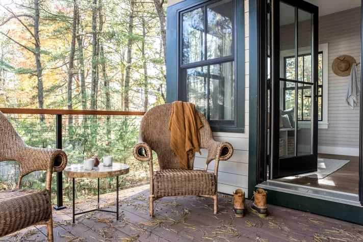 Wicker cane chair for balcony in brown