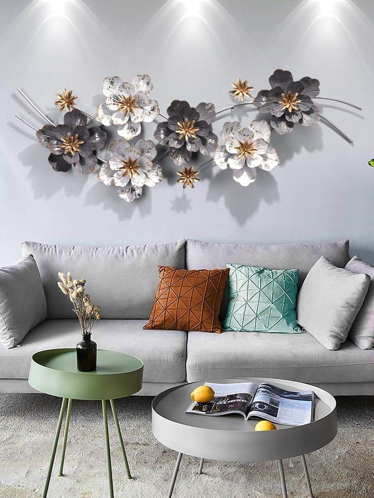 floral metal wall sculpture in living room