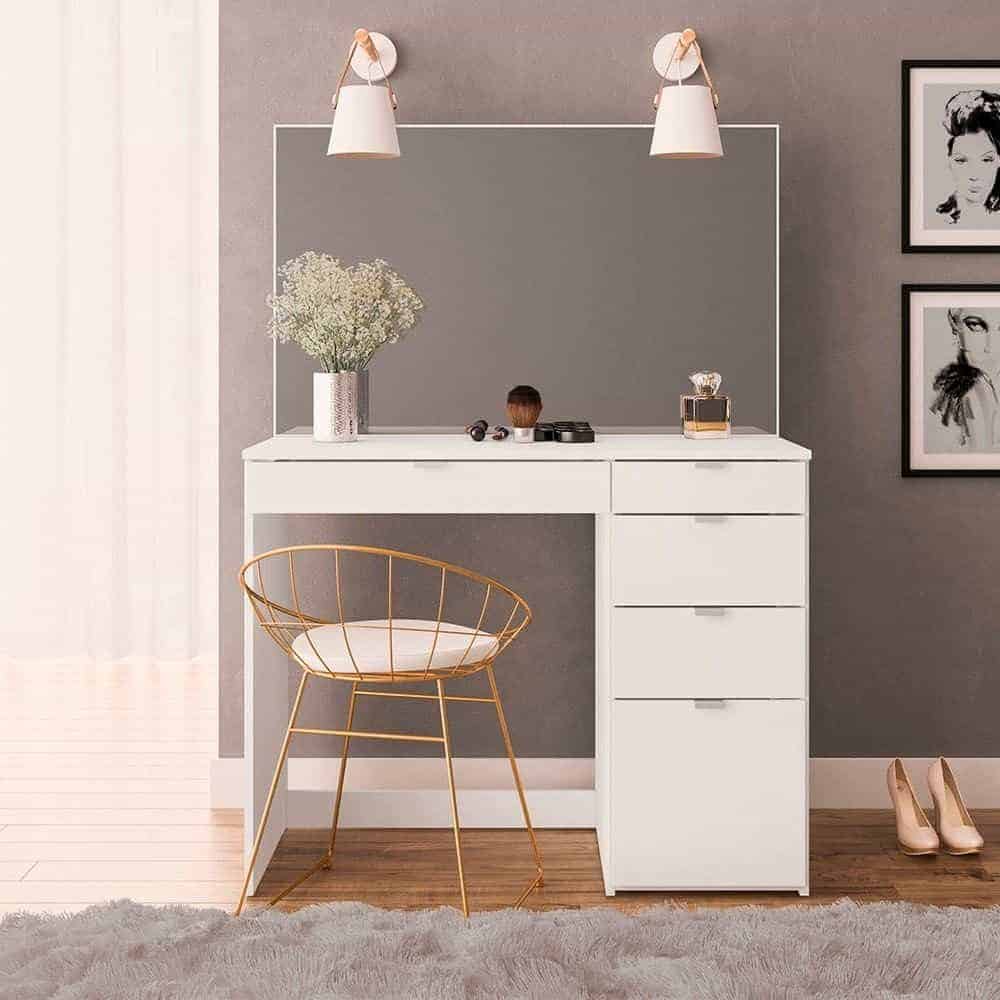 A simple white-colored dressing table design with a big mirror, good storage space, and a matching chair, in a gray room.