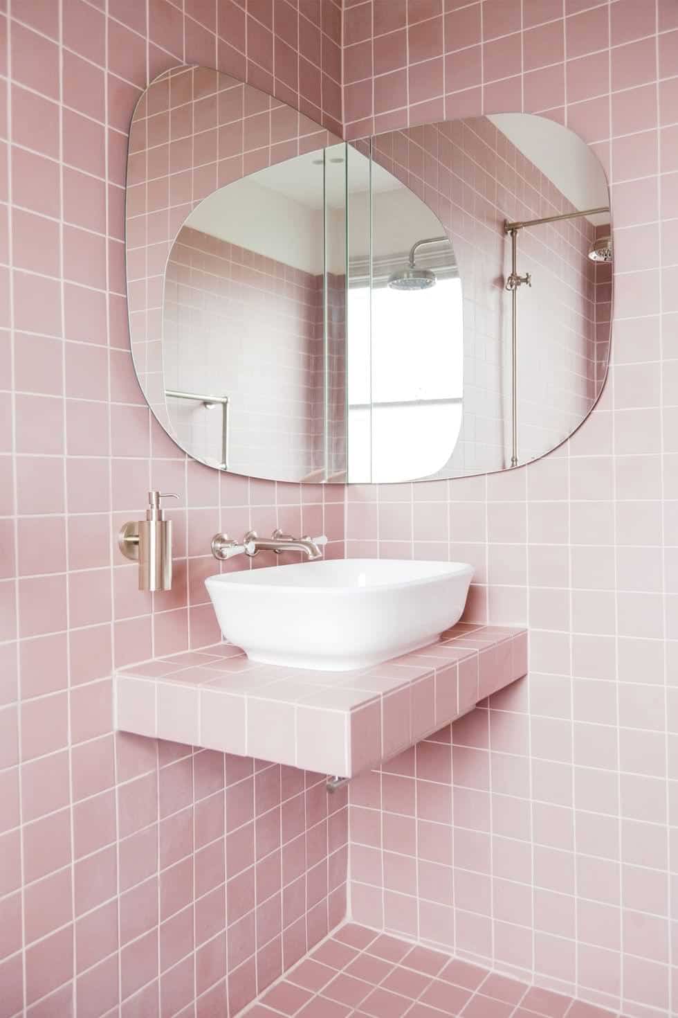 Baby pink tiles in bathroom
