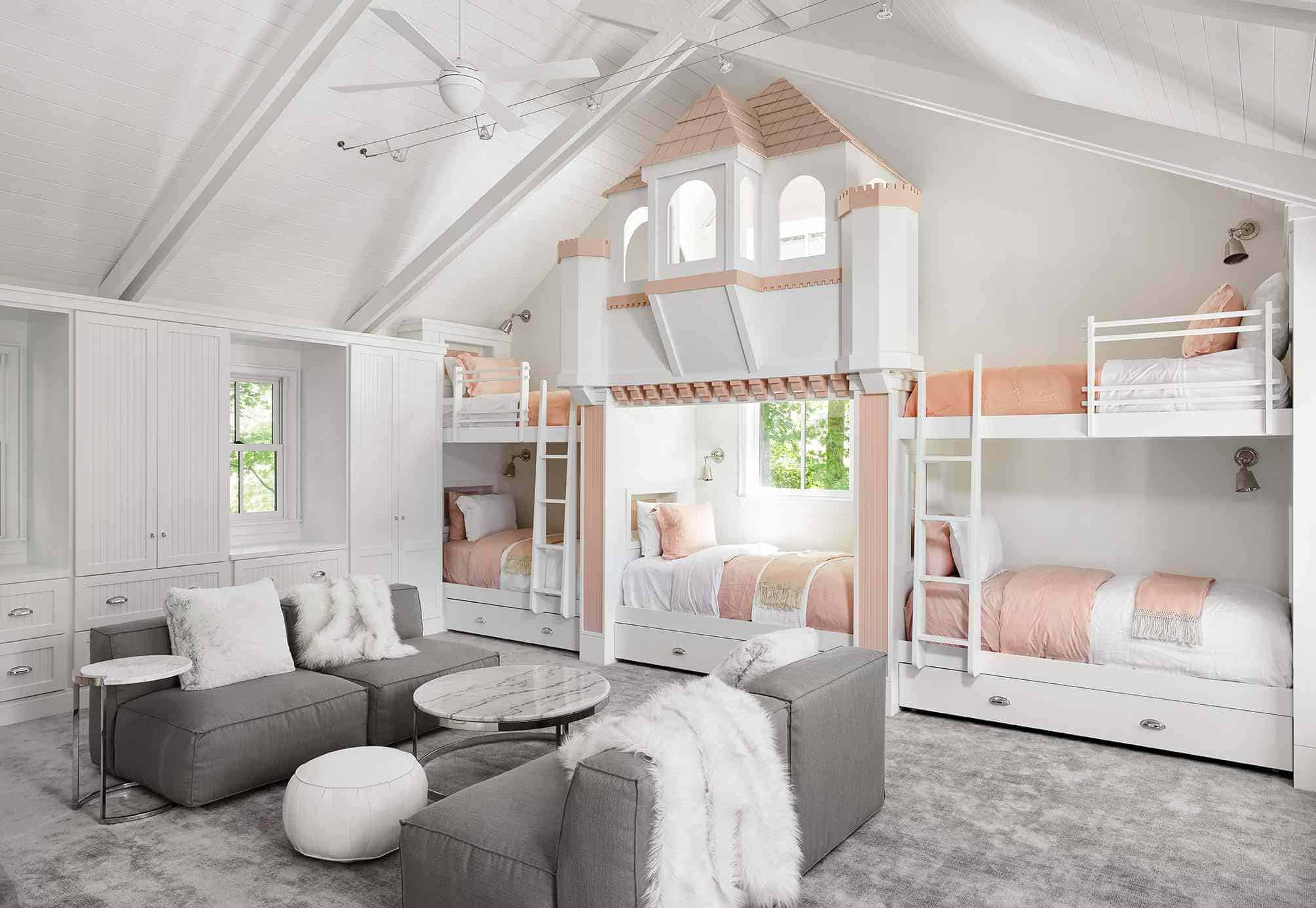 Beautiful kids room with castle like bunk beds and living are