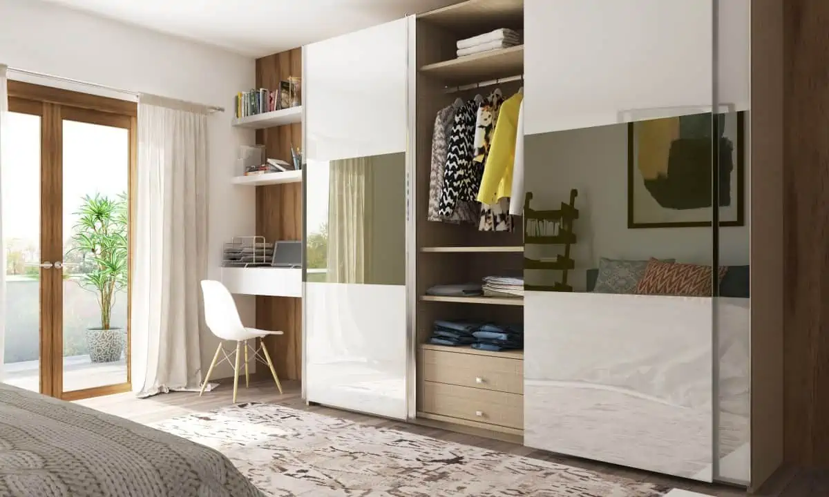 a white closet with a study station attached