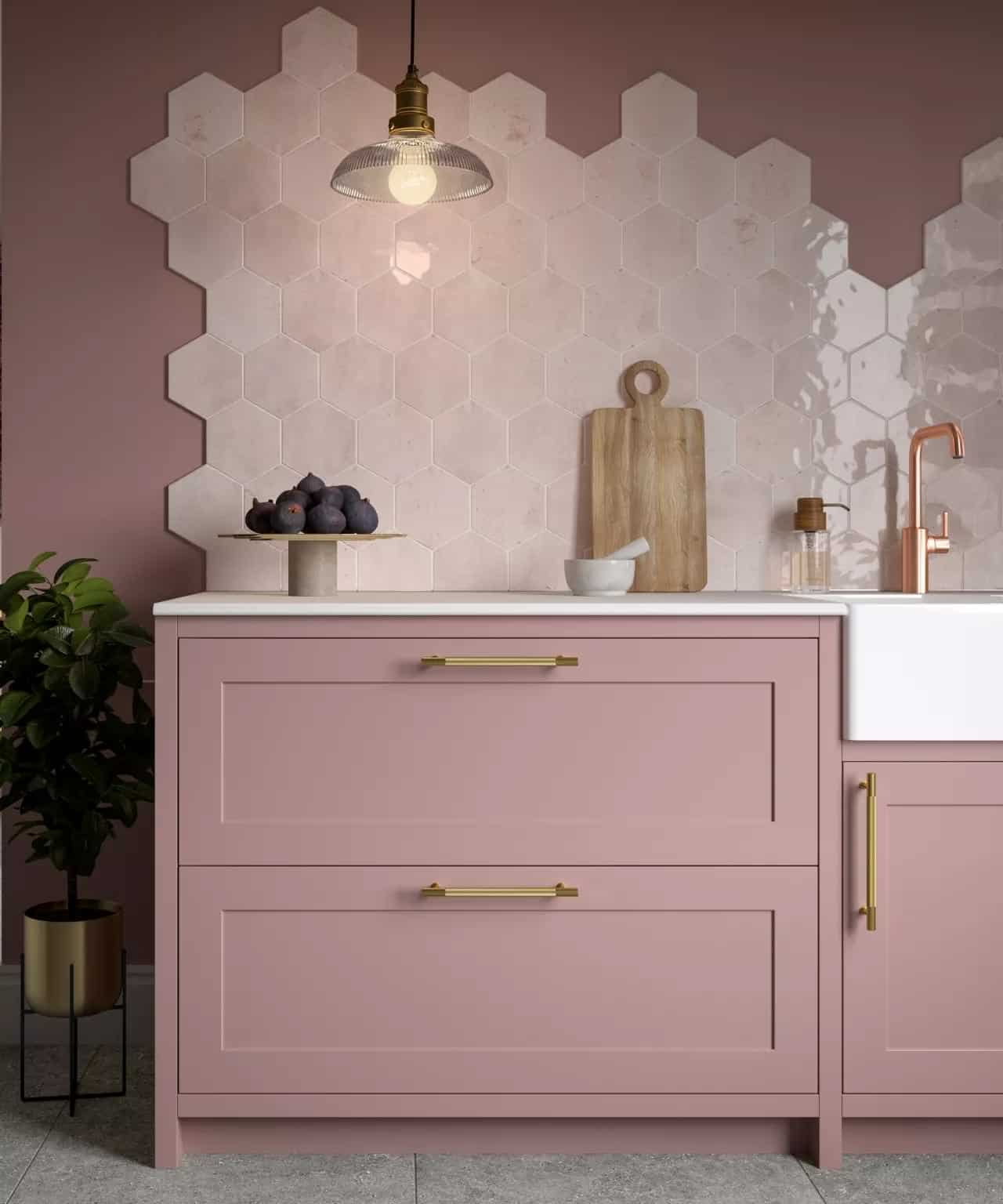 Pink kitchen with hexagonal wall tiles