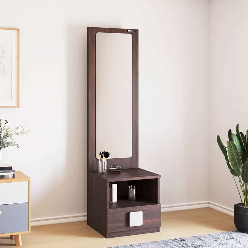 A sleek wooden dressing table design with a rectangular mirror and little storage space, in a white room.