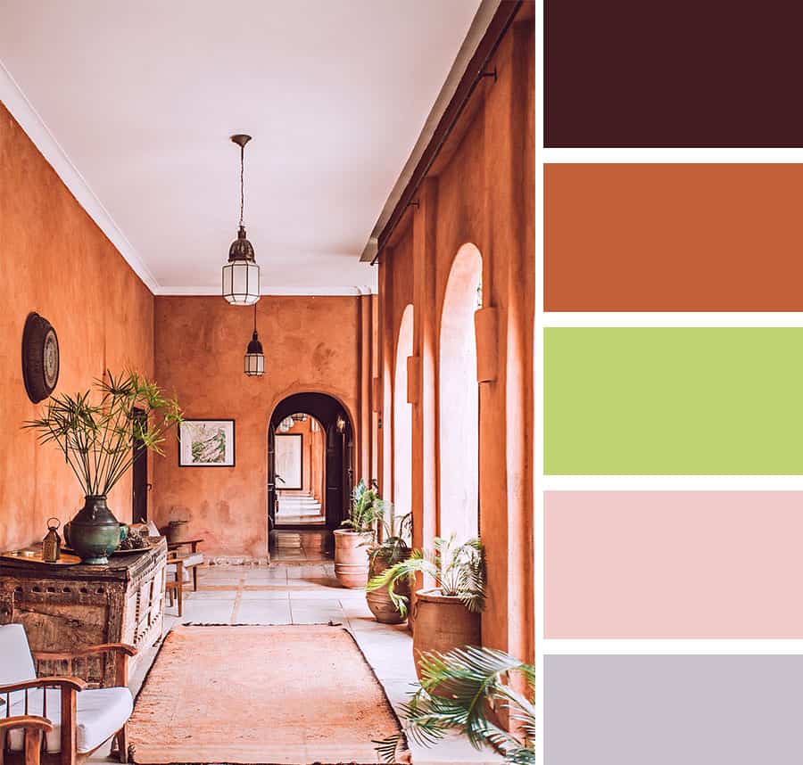 Home colours of a brown hallway with pastel colour flowers and other accessories