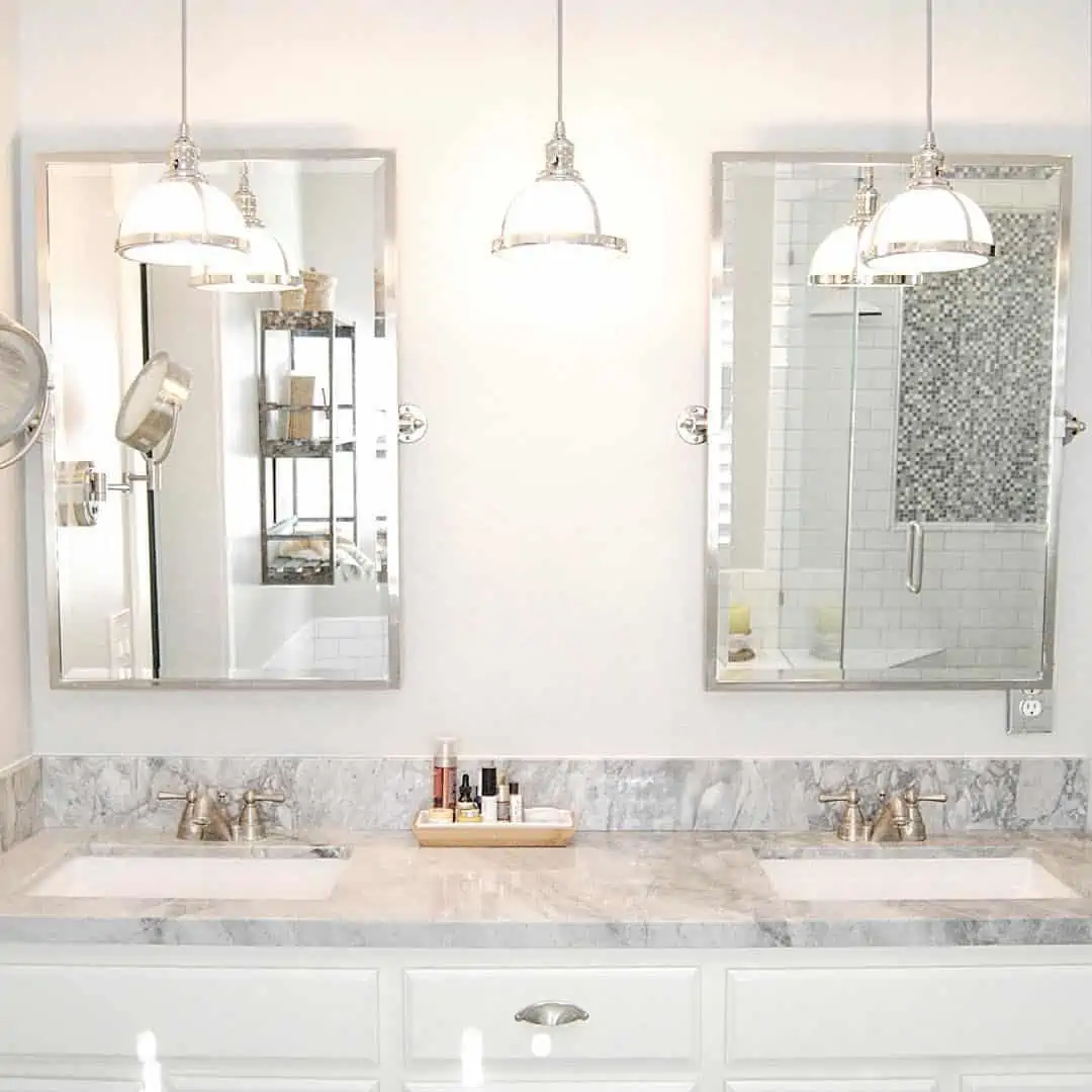 Pendant lights over vanity mirrors