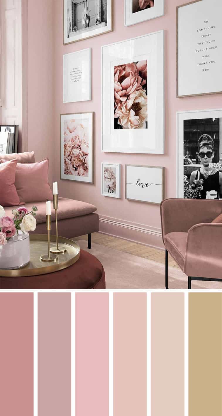A living area with pastel pink walls, blush pink sofa and gold accessories