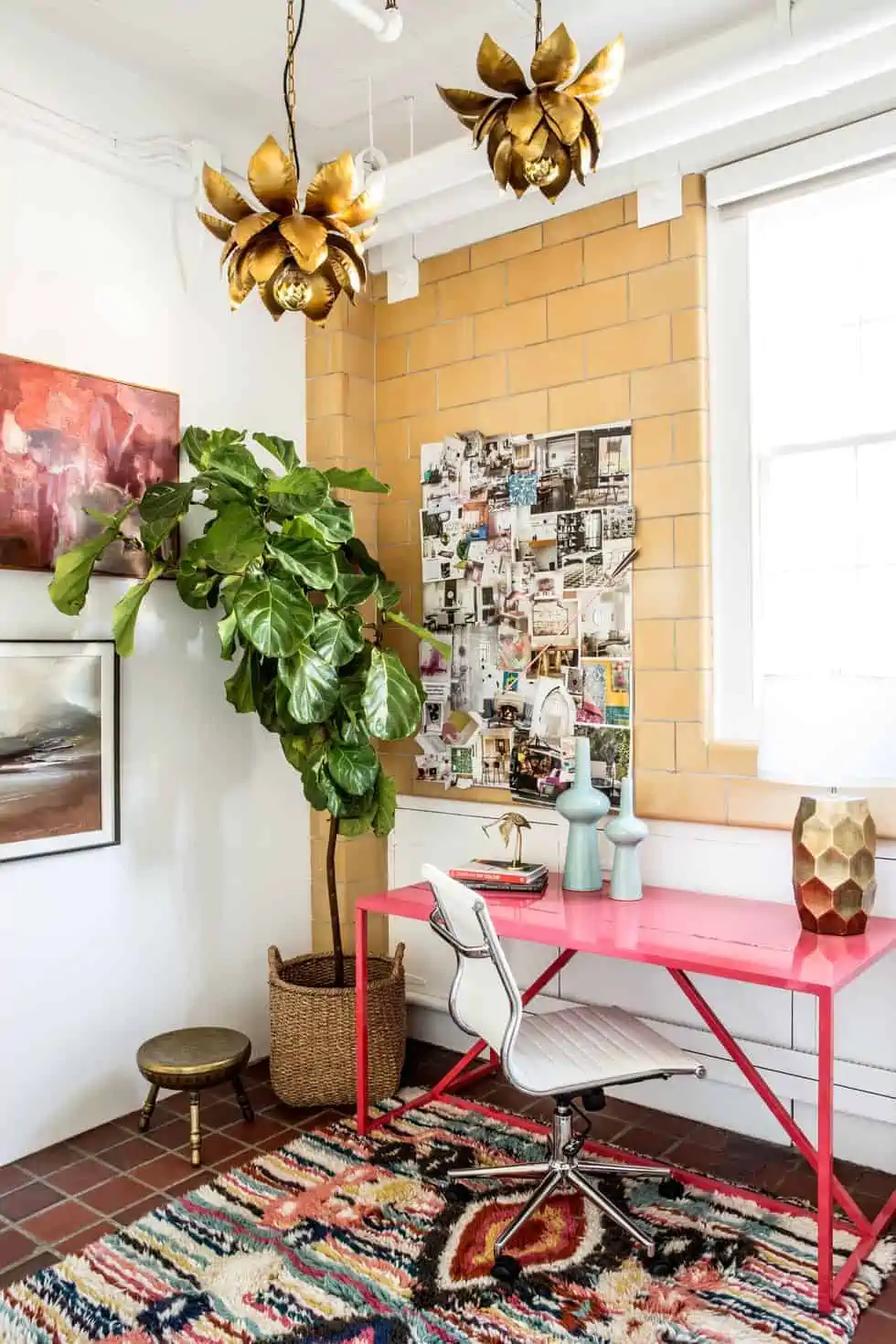 Small home office with pink table and white chair