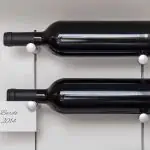 Salice Pin wine brackets with black wine bottles