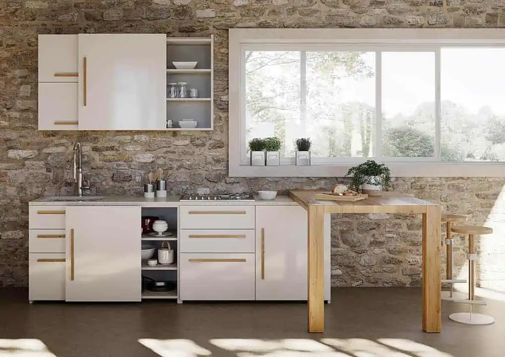 A white-colored sliding cabinetry in a open kitchen space.