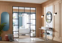 Villeroy & boch luxury bathroom collection featuring white bathtub, washbasin, round mirror - ANTHEUS