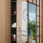 round mirror for bathroom with concealed shelves featured in the antheus collection by villeroy & boch