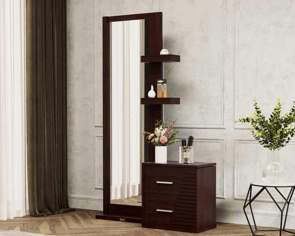 A stylish dressing table with floating shelves, kept in a room with minimal decor.