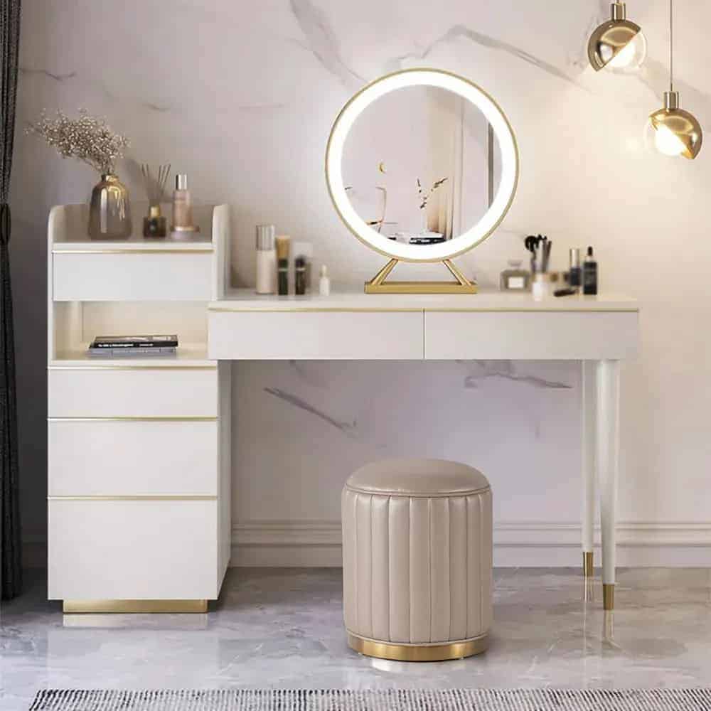 A graceful dressing table design with a round mirror and ring light..