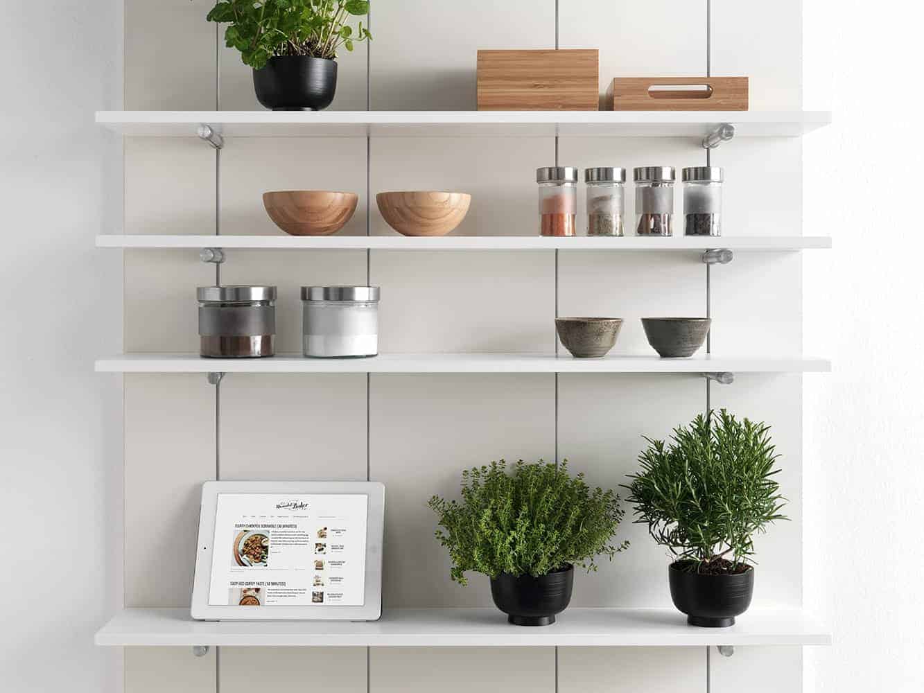 Salice Pin shelf with decor elements such as indoors planters, books, bowls, frame