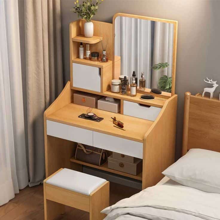 A square mirror bedside dressing table with matching stool and lots of storage space.