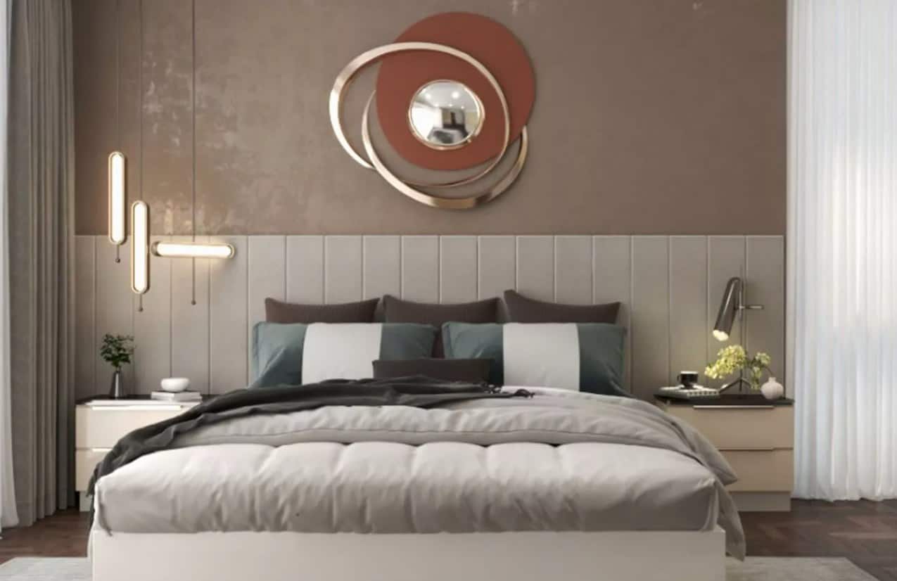 bedroom with a maroon and silver wall art piece, bed and lamps