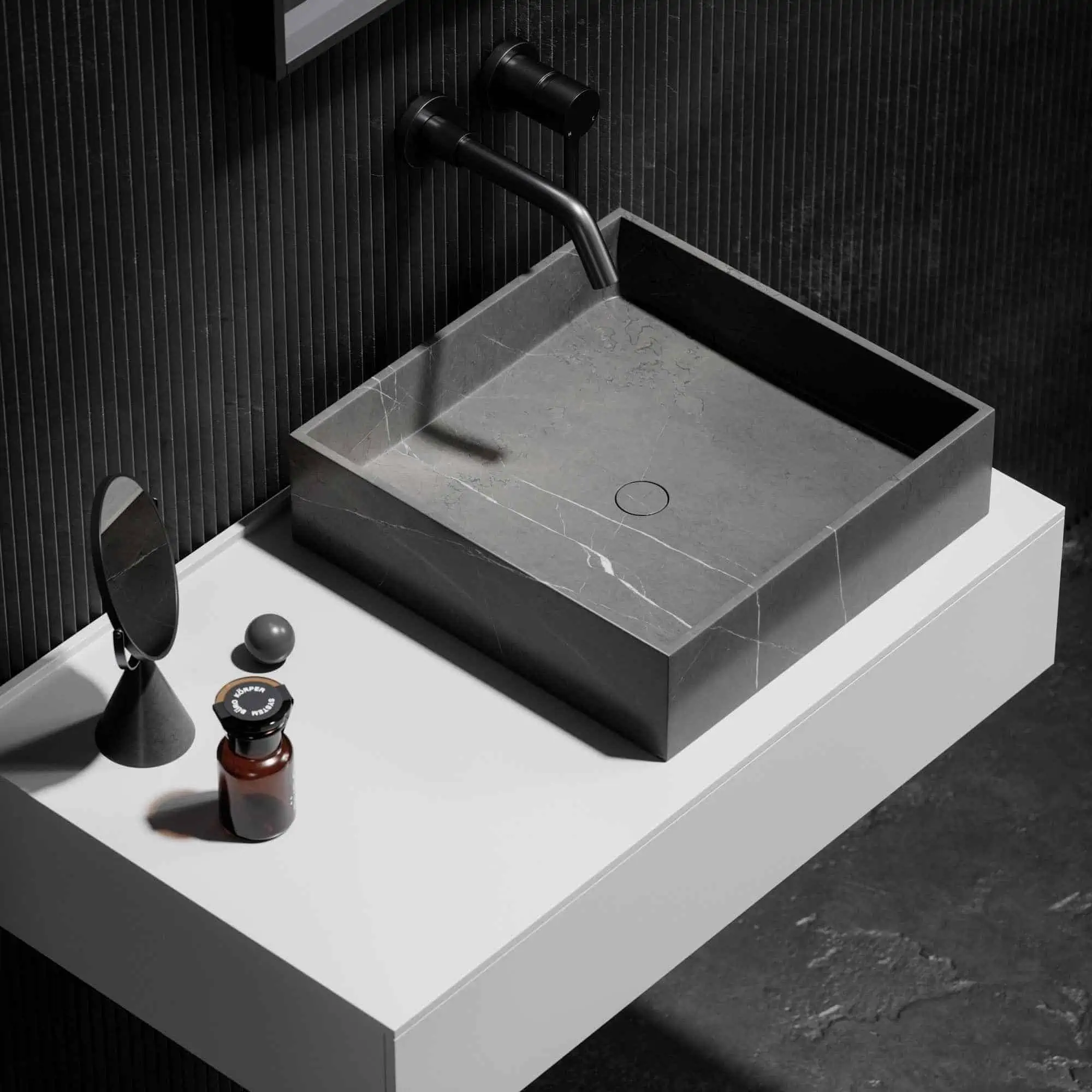 stunning black washbasin with a tap inside a bathroom