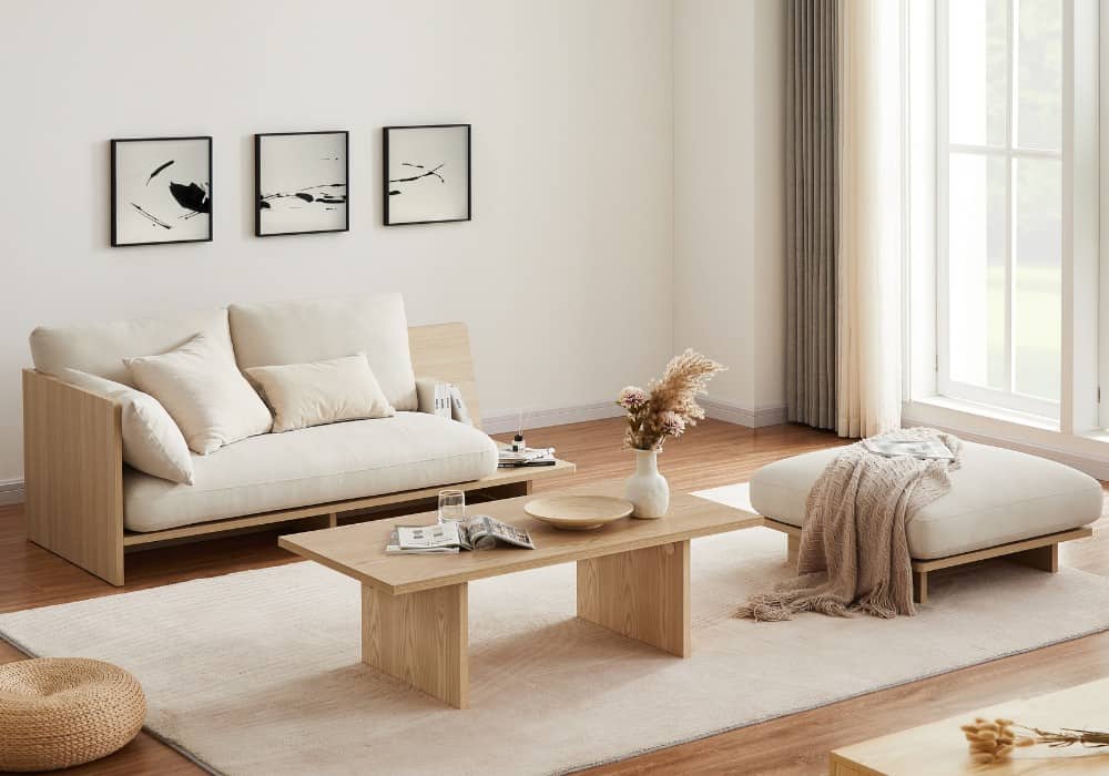 white living room with sofa, table and a white rug