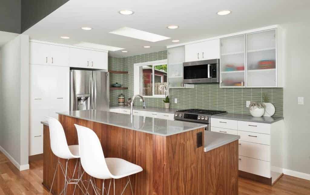 kitchen with easy to clean glossy backsplash green tiles