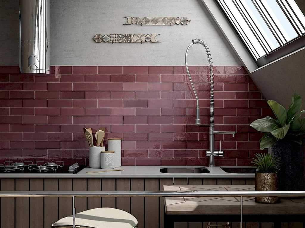 kitchen with easy to clean glossy backsplash tiles in maroon