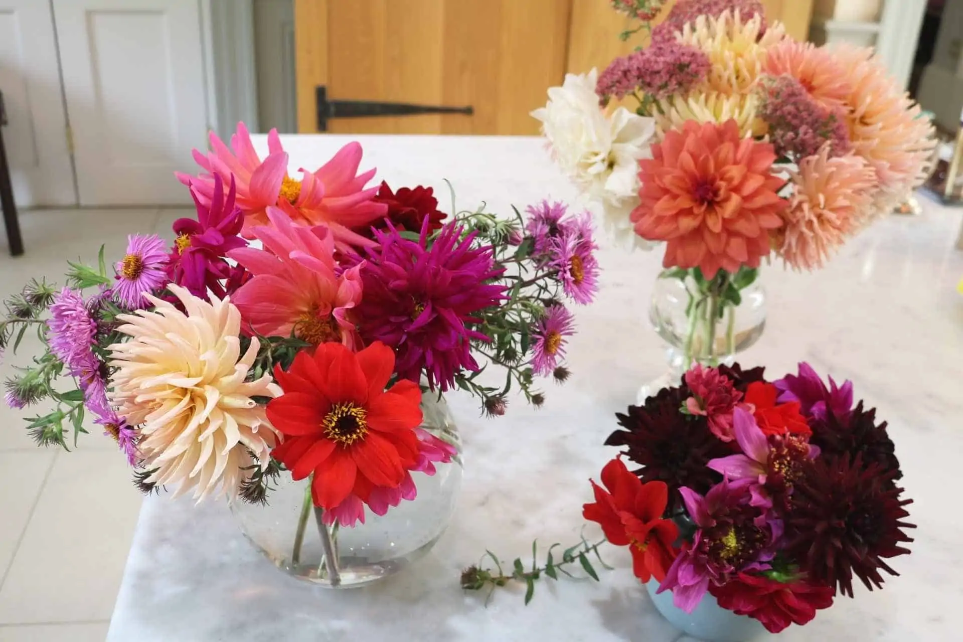 multicolor flowers on a white table