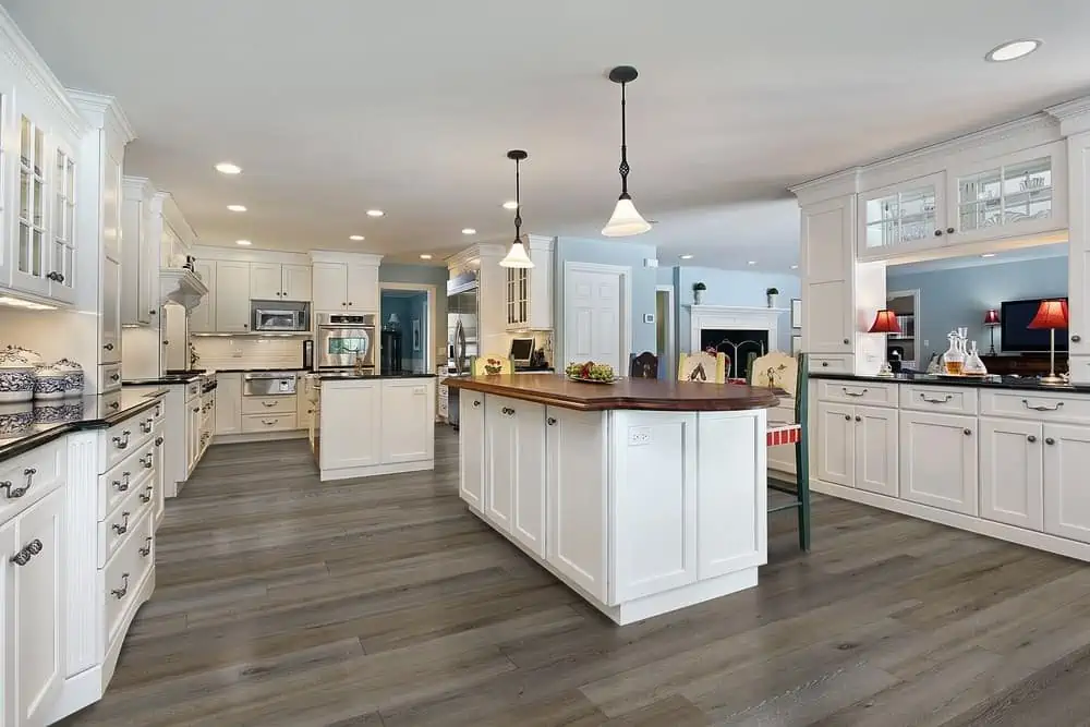 A beautiful kitchen area with strudy flooring, with best furniture.