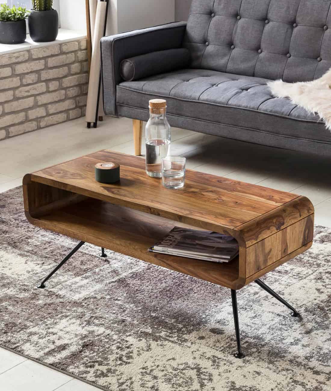 Wooden centre table with a bottle