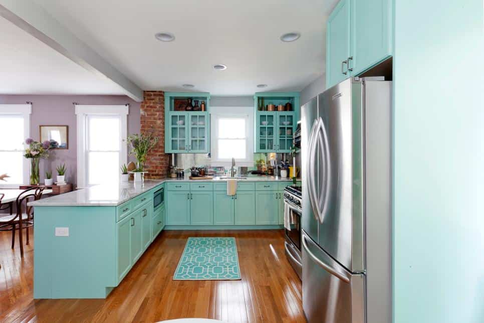 Monochrome turquoise kitchen cabinets