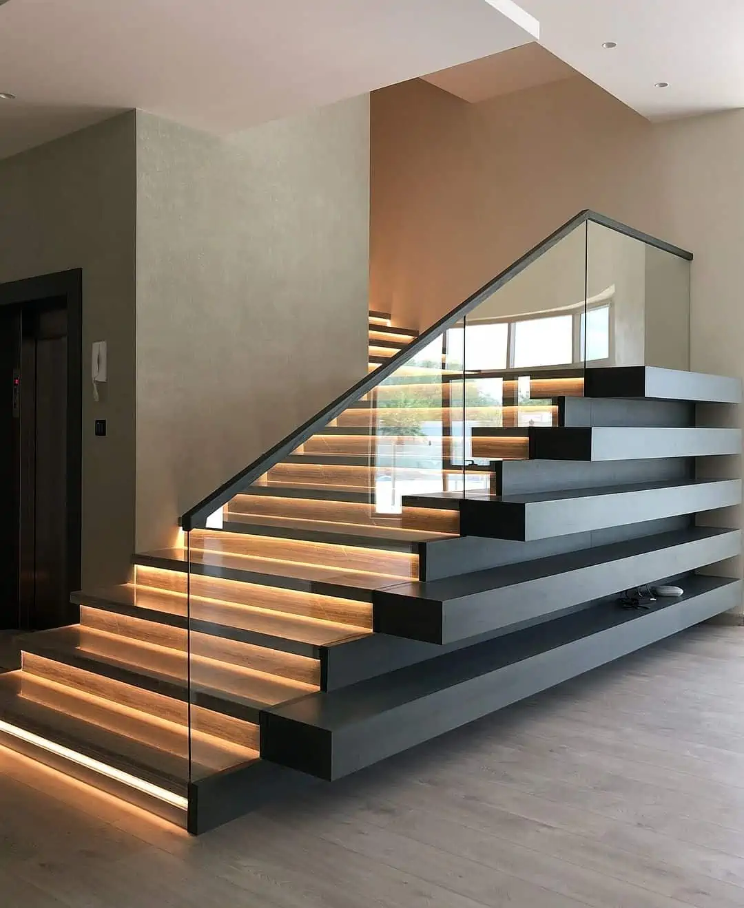 A perfectly lit staircase with lighting strip LEDs.