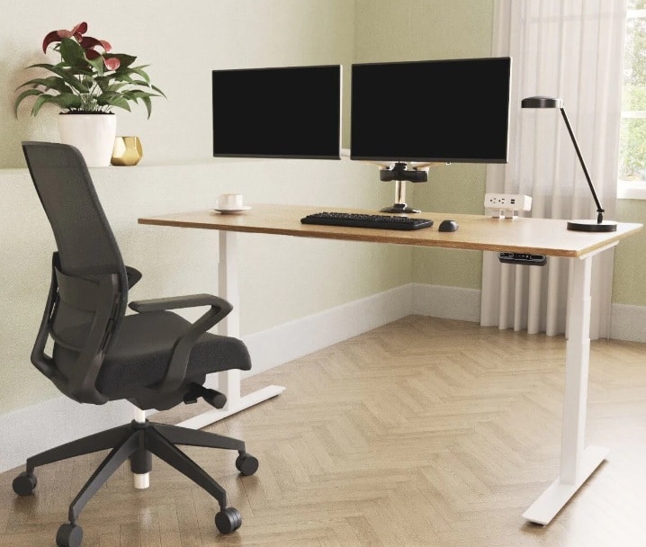 Standing and adjustable wooden desk with metal legs and office chair