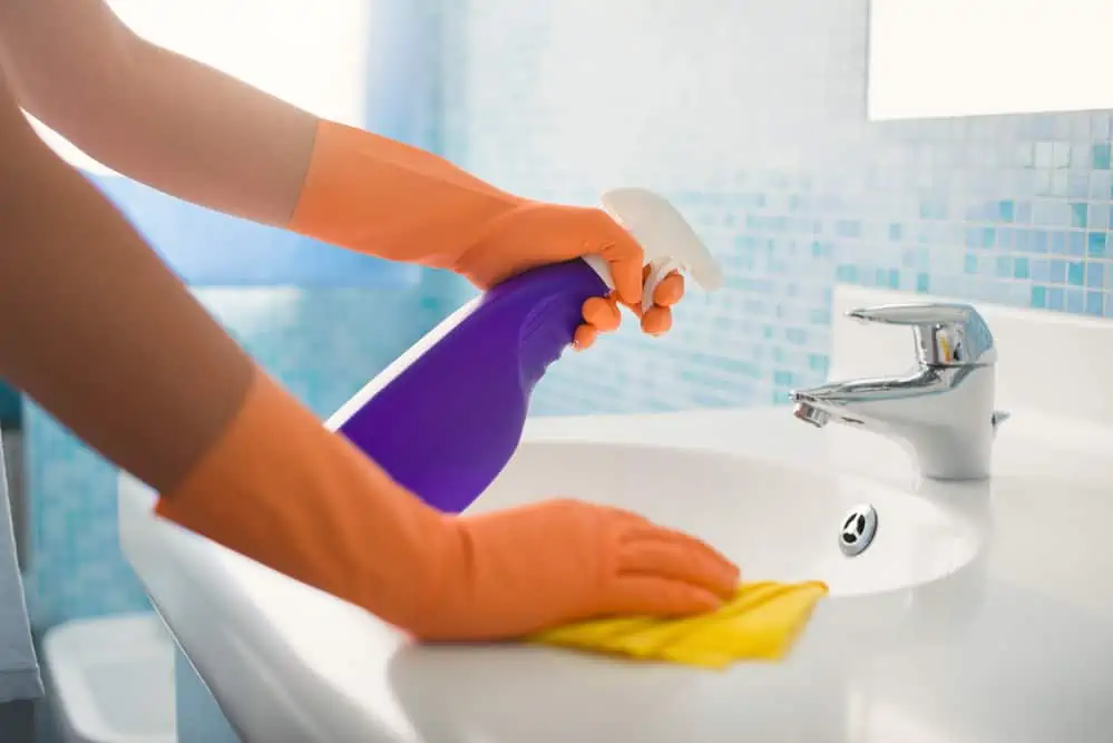 bathroom fittings cleaning process, cleaning of a stainless steel faucet in chrome finish