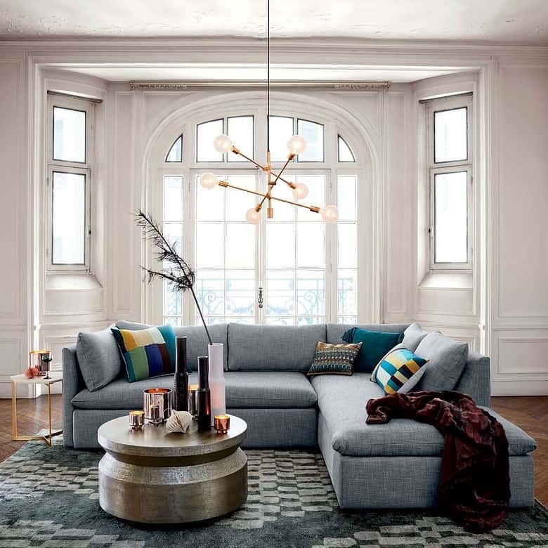 grey sofa, table, rug