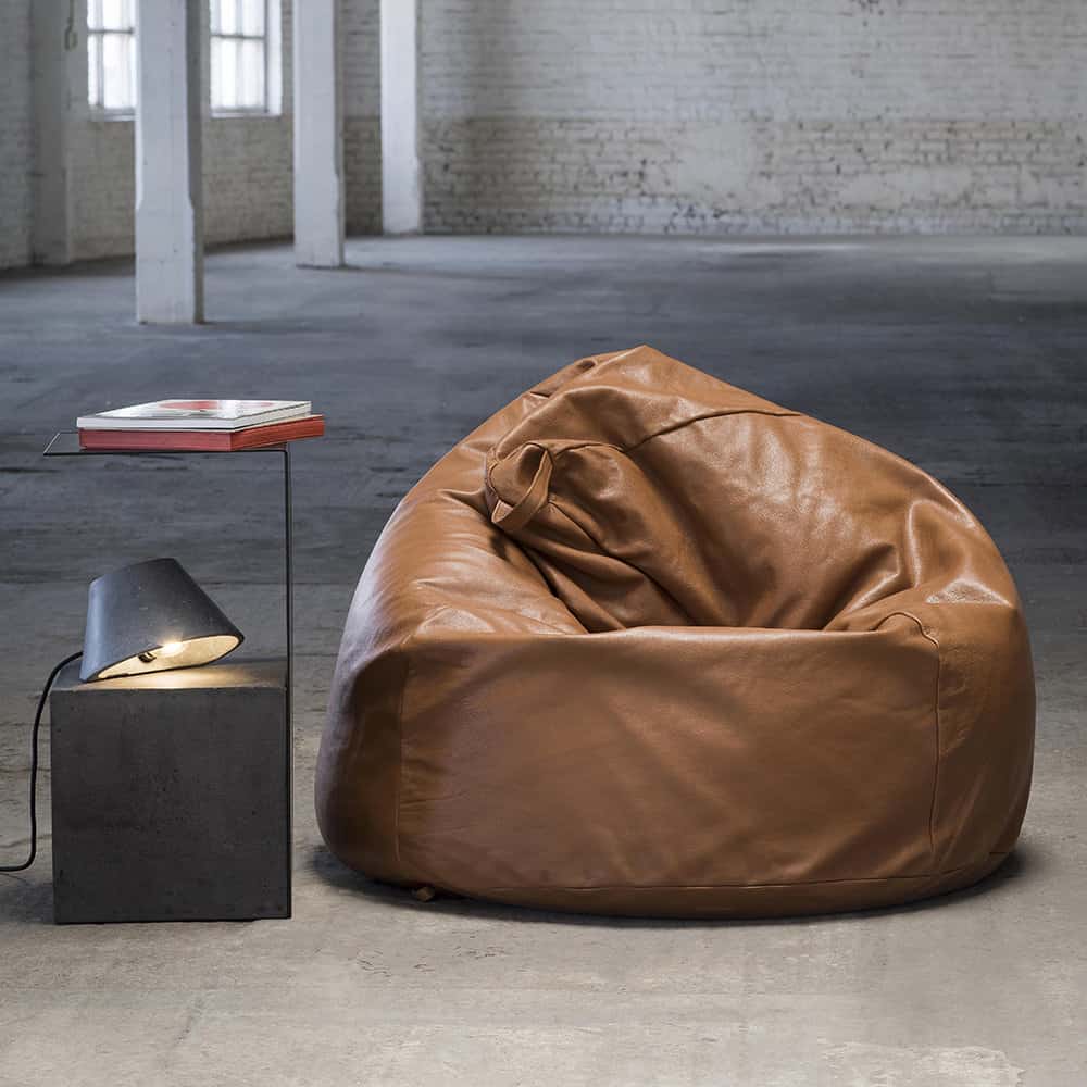 rich brown leather beanbag in an industrial style home