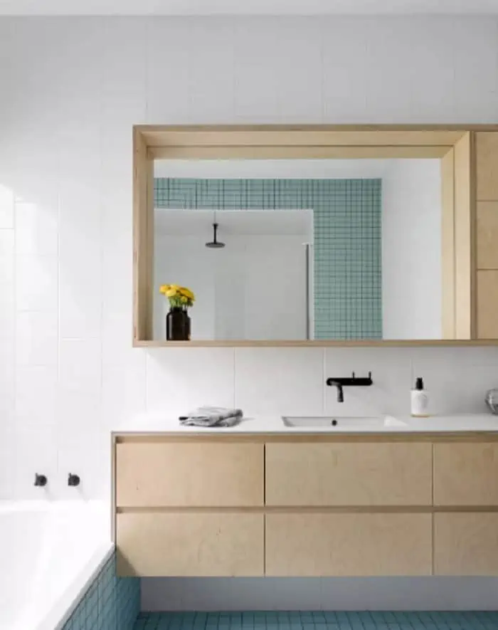 light brown coloured dresser with rectangular mirror