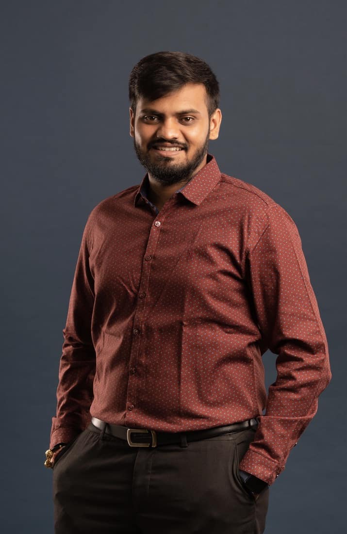 Ankit jain, maroon shirt 