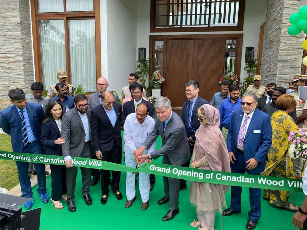 Canadian wood villa inauguration with green carpet and brown doors by MAK projects sustainable wood homes made with building materials